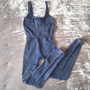 NWOT- Free People Movement Good Karma Onesie